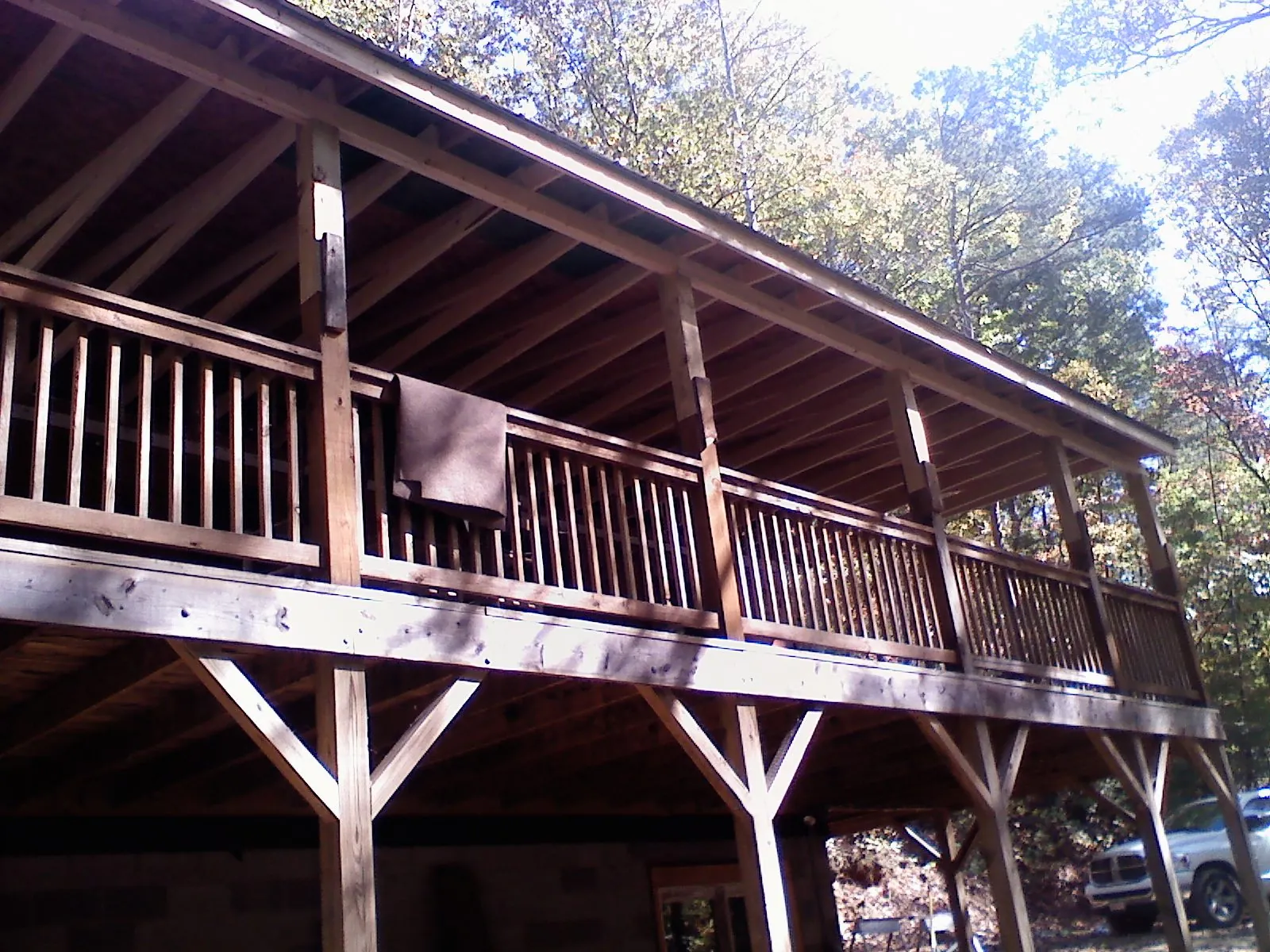 Timber framing under a new elevated porch and deck — Roof Leak Repair in Hill by Roofing Brothers